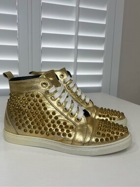 Metallic Gold High-Top Sneakers with Stud Details by Rodney P. Hunt